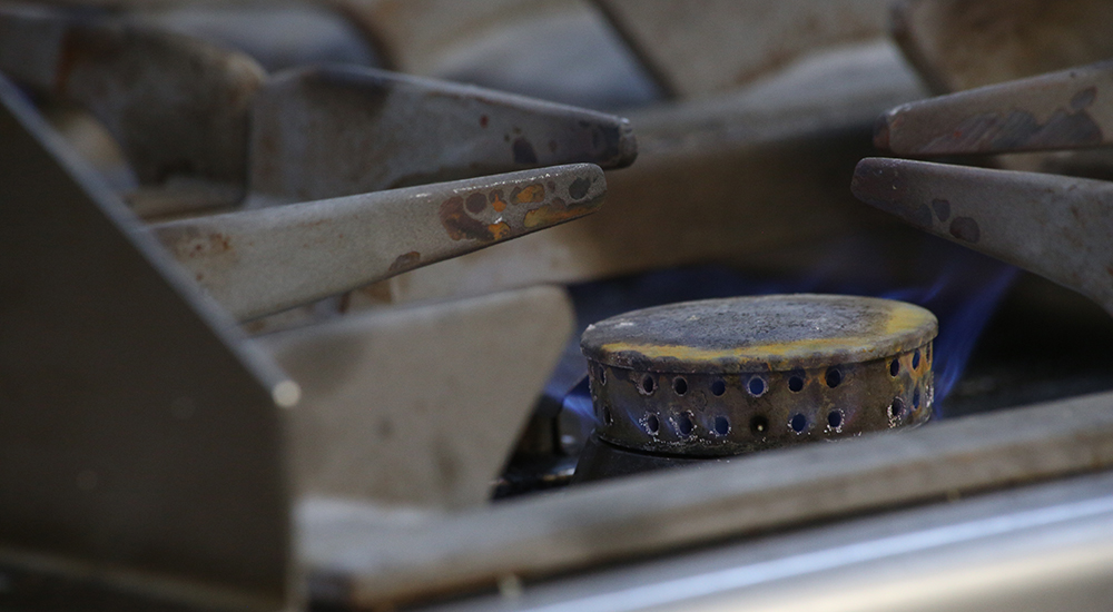 Close up of Gas stove burner at Allerton golf club kitchen